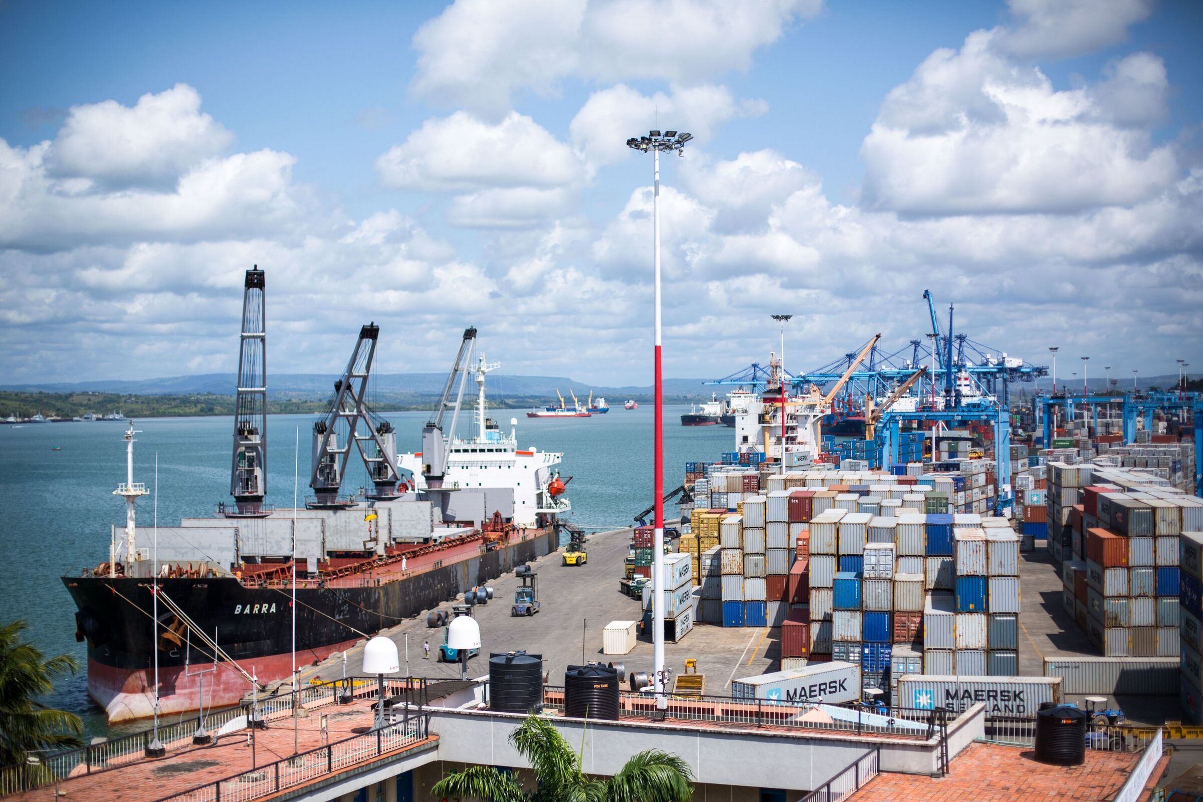 Ships, cranes and stacked containers at the Port of Mombasa on Kilindini harbour.